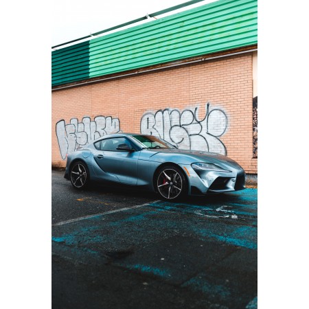 Gray Luxury Car Parked Beside Wall With Graffiti 24"x36" Photographic Print Poster