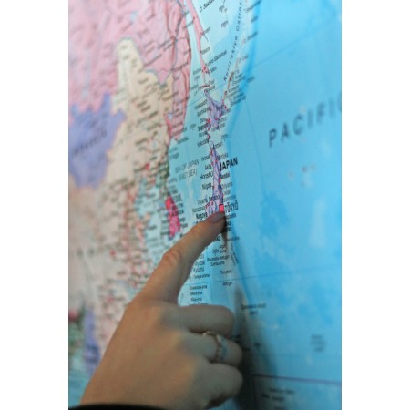 Person Pointing On Map 24"x36" Photographic Print Poster