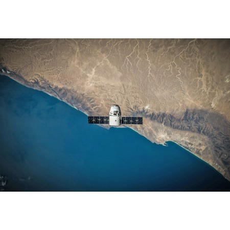 A Space Satellite Hovering Above The Coastline 24"x16" Photographic Print Poster