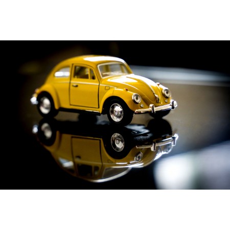 Yellow Volkswagen Beetle toy 24"x16" Photo Print Poster