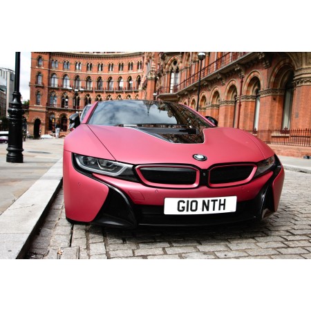 Red BMW Sports Car Near Brown Concrete Building 24"x16" Photographic Print Poster