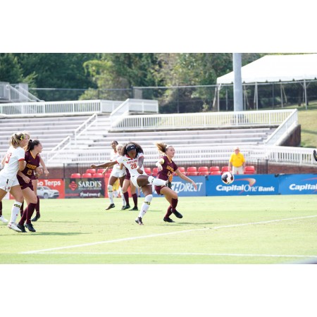 Woman Playing Soccer On The Field 24"x16" Photographic Print Poster