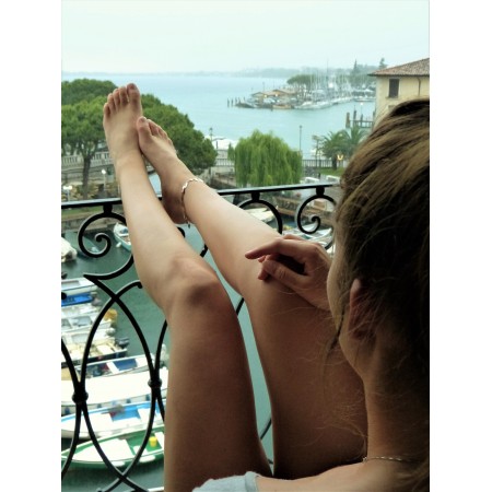 24x17 in Photographic Print Poster Young woman Vacations Sit Window Balcony Port