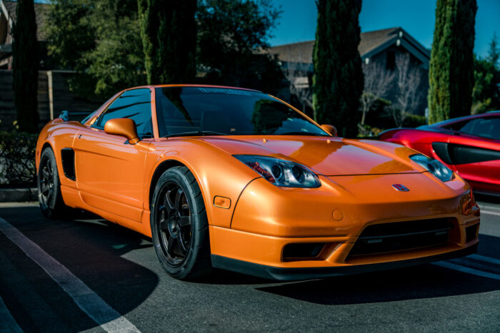 Orange Ferrari 458 Italia Parked On Road Photographic Print Poster