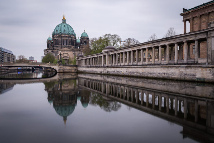 Berlin cathedral is reflecting in the river Spree. View from west towards east.