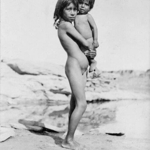 A Laguna Girl – Nude Pueblo Indian Girl Holding Small Child