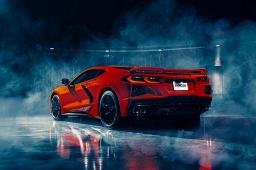 Red Corvette Stingray in Neon Smoke – High-Performance Supercar Poster