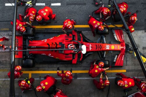 Ferrari F1 Pit Crew Overhead Poster – Formula 1 Racing Team Wall Art | High-Speed Motorsport Decor picture