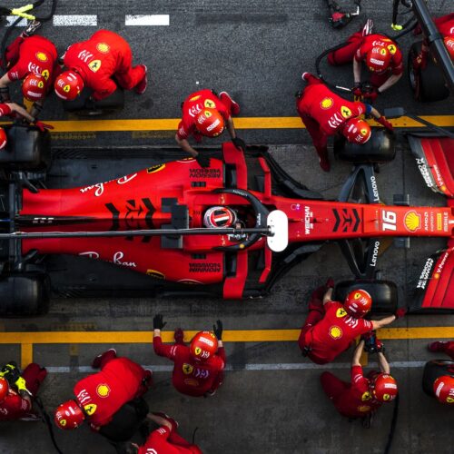 Ferrari F1 Pit Crew Overhead Poster – Formula 1 Racing Team Wall Art | High-Speed Motorsport Decor picture