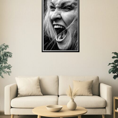 Raw Emotion Portrait – Screaming Woman in High Contrast B&W picture