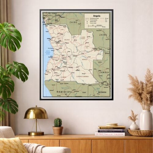 Vintage-style map of Angola showing provinces, international boundaries, railroads, roads, and neighboring countries including Zaire, Zambia, Namibia, and Botswana with warm cream and sage green color palette.