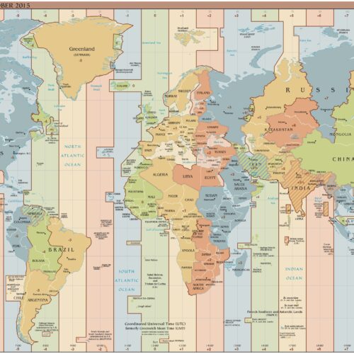 Detailed world time zones map showing UTC offsets across continents with warm and cool color zones, countries labeled, and geographic borders clearly defined.
