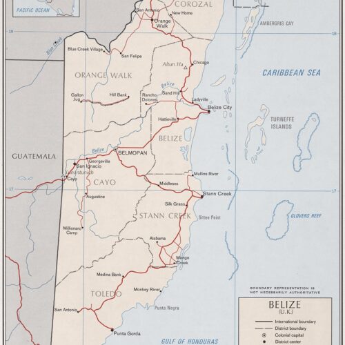 Political map of Belize showing districts, international boundaries, major cities, Caribbean coastline, and road networks in cream and blue cartographic style.
