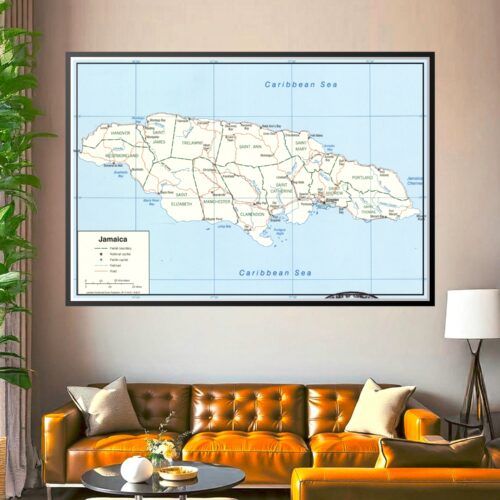 Political map of Jamaica showing parish boundaries, major cities, roads, railroads, and Caribbean Sea geography with clear labels and scale.