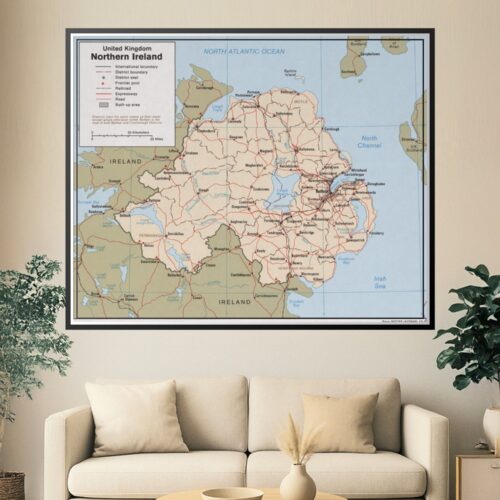 Political map of Northern Ireland showing district boundaries, cities, roads, expressways, and international borders with Ireland and Scotland.