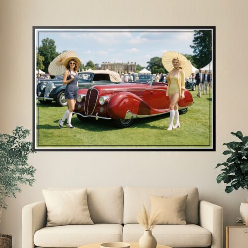 Two women in 1940s attire with umbrellas posing beside a crimson classic roadster at a vintage car exhibition, lush green lawn and manor house in background.