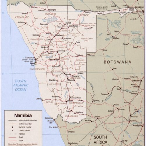Political map of Namibia showing international borders, district boundaries, major cities, roads, and railroads across southern Africa.