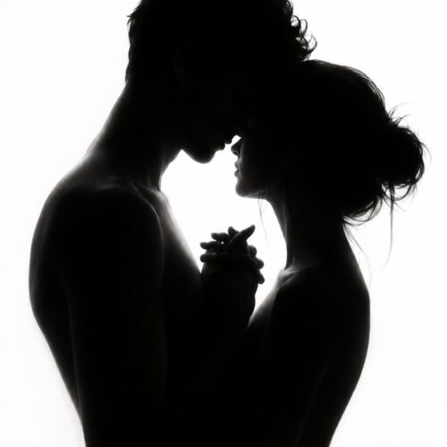 Black silhouette of a couple in intimate embrace against white background, showing tender connection and vulnerability.