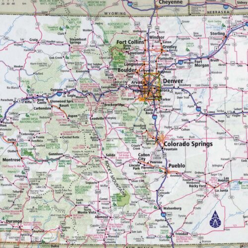 Detailed road map of Colorado showing highways, cities, mountains, national forests, and landmarks in classic cartographic style with pink and green coloring.