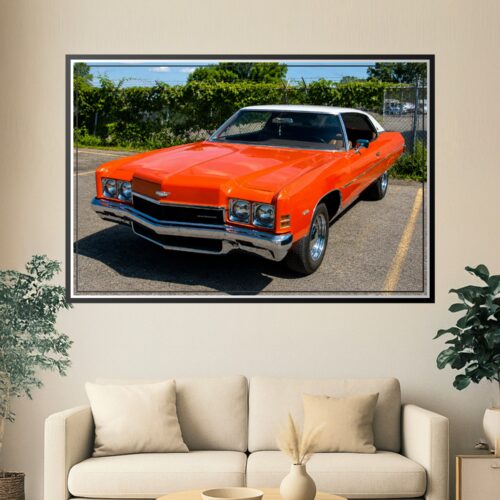 Vibrant photographic poster of a cherry-red 1970s Chevrolet Impala Coupe with chrome details and dual headlights parked in bright daylight.