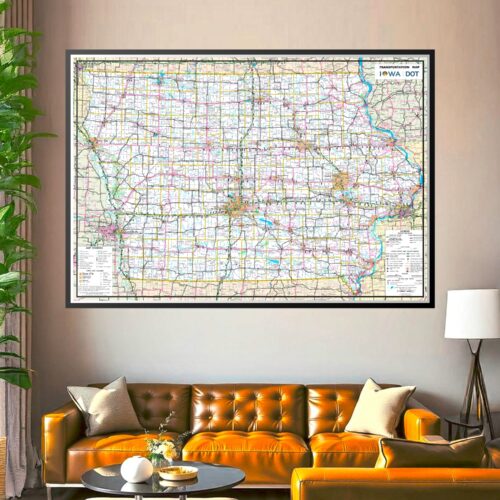 Comprehensive Iowa DOT transportation map showing highways, county boundaries, roads, and waterways in yellow, pink, blue, and green colors with detailed road network grid pattern.