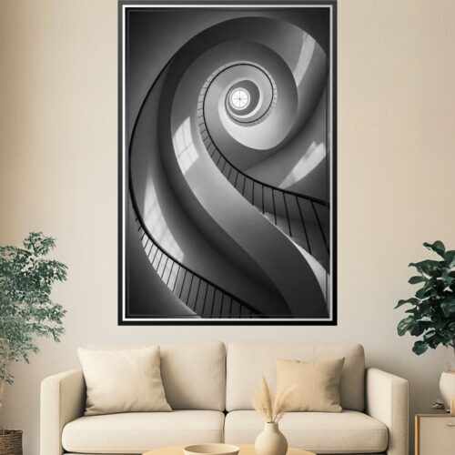 Black and white minimalist spiral staircase with geometric curves and dramatic lighting converging toward a bright center point, architectural wall art poster.