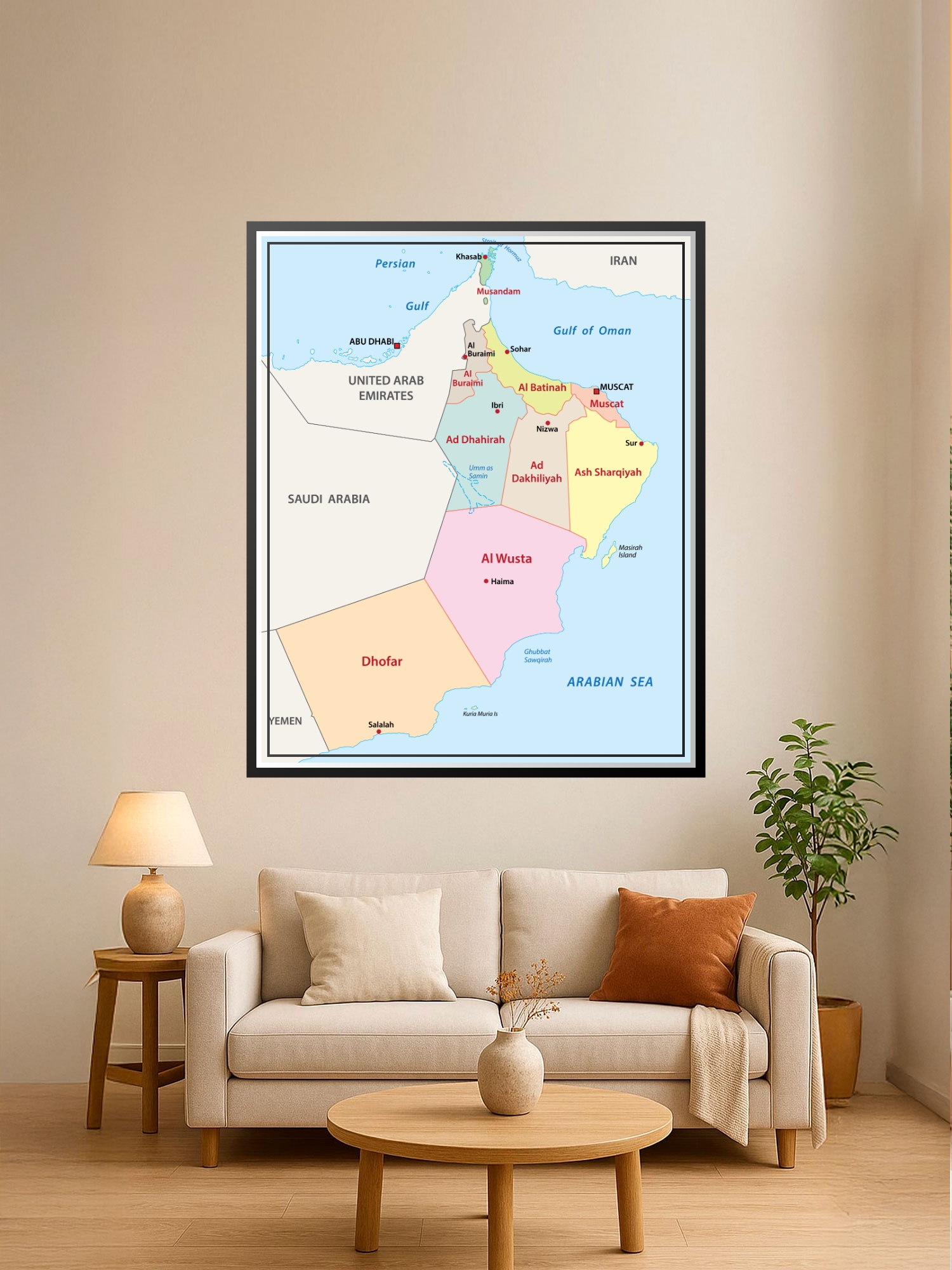 Political map of Oman showing 11 governorates with color-coded regions, labeled cities including Muscat and Dhofar, and surrounding countries and water bodies.