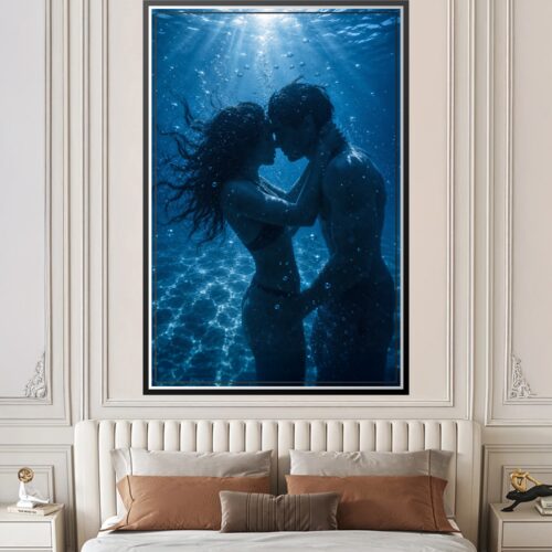 Two silhouetted figures embracing underwater surrounded by shimmering sunlight rays and bubbles against deep blue ocean background.