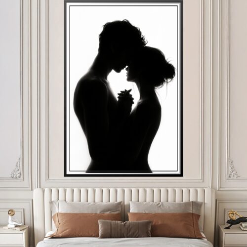 Black silhouette of a couple in intimate embrace against white background, showing tender connection and vulnerability.