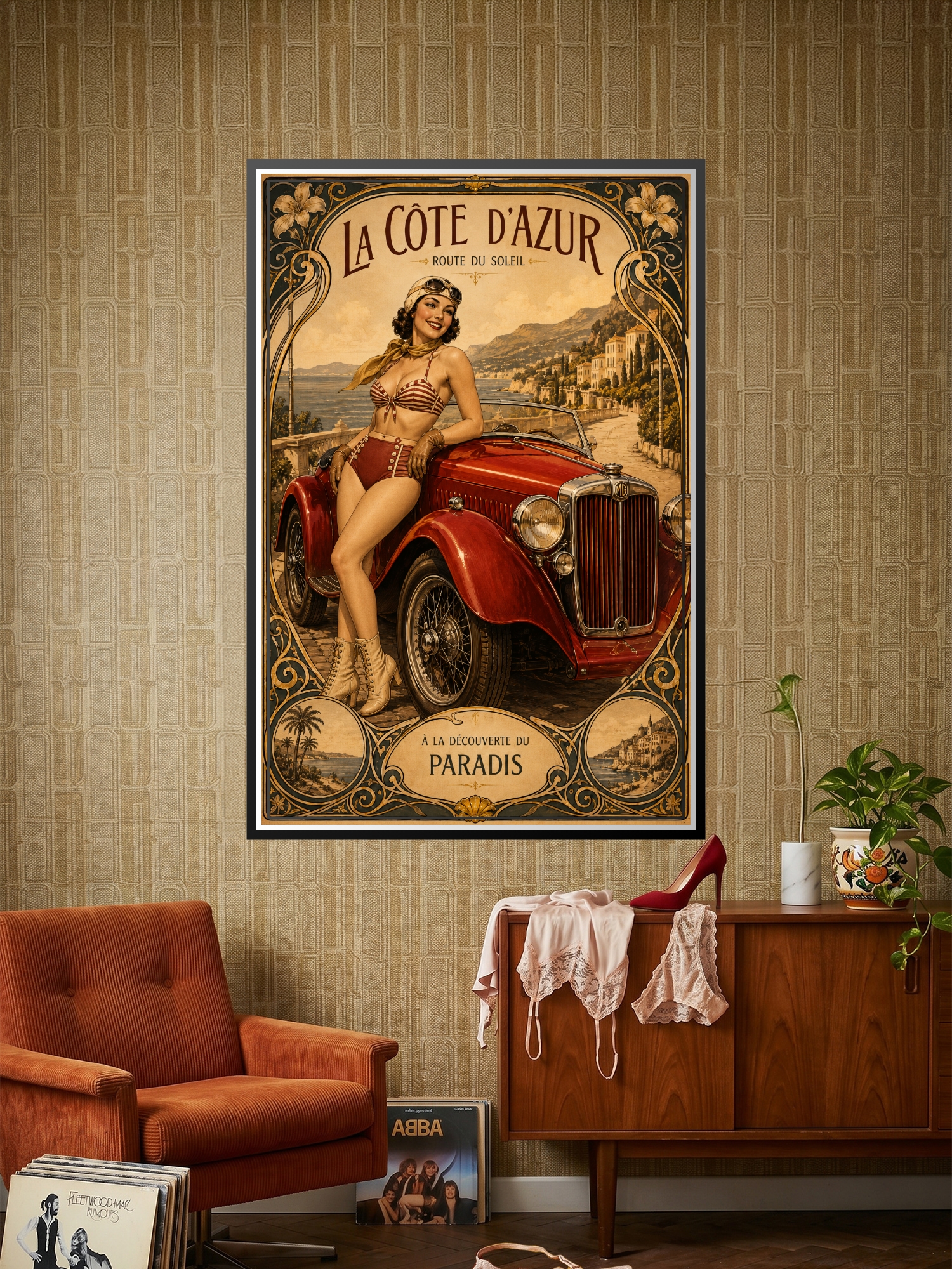 Vintage art deco poster of a glamorous woman with a red sports car overlooking the Mediterranean coastline with ornate gold and black decorative border.
