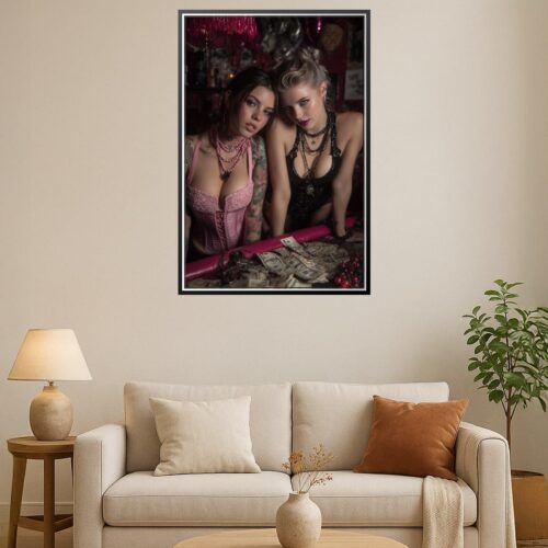 Glamour photography featuring two models in pink and black attire with a vibrant backdrop